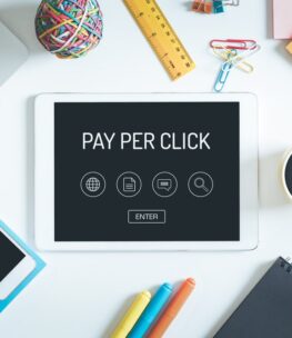 PAY PER CLICK Concept on Tablet PC Screen with Icons